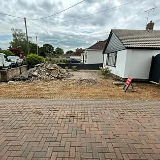 Rubble cleared and sub-base exposed ahead of new paving