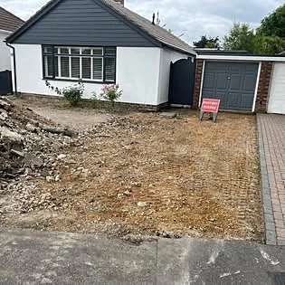Driveway area cleared and prepared before paving